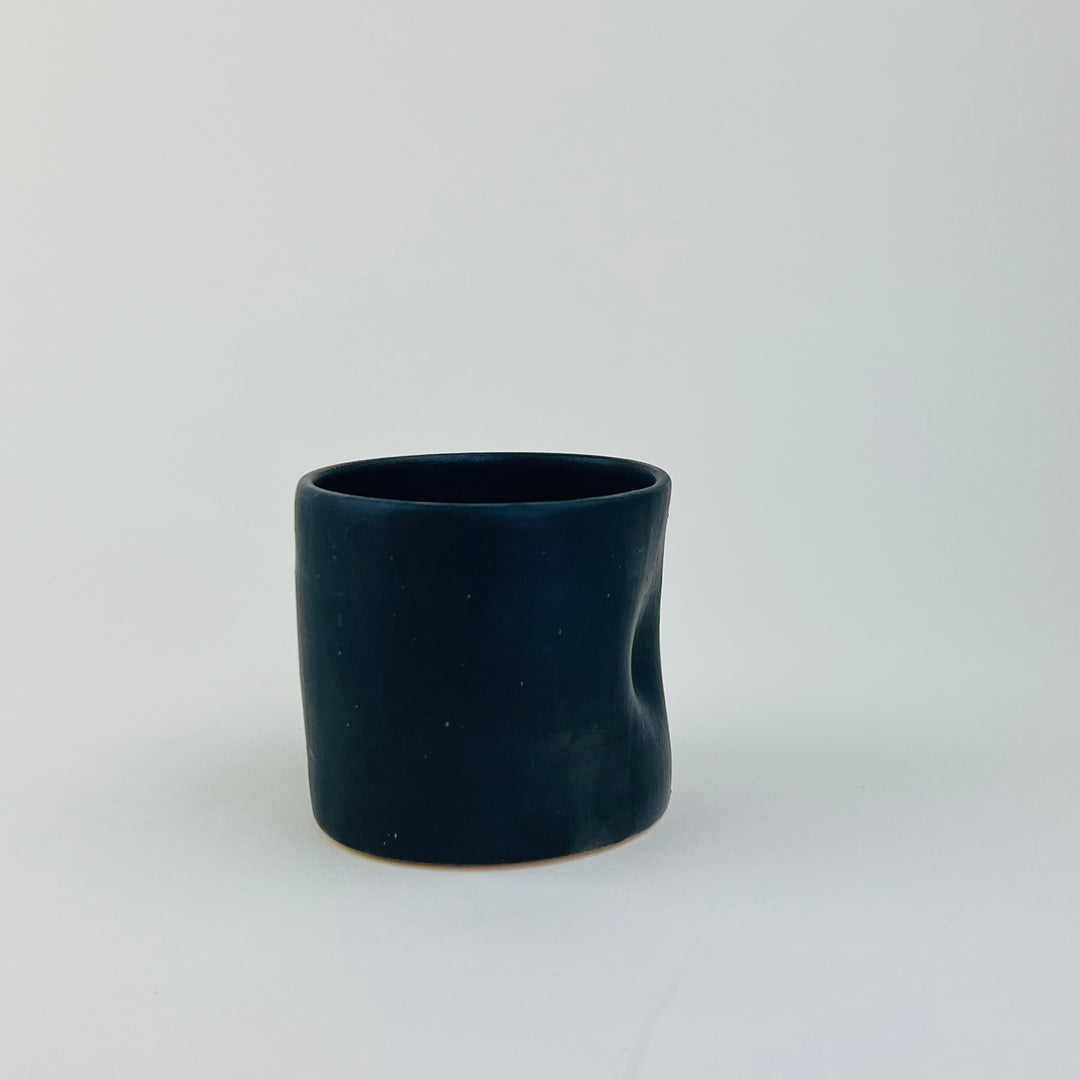 Hand thrown pinch mug